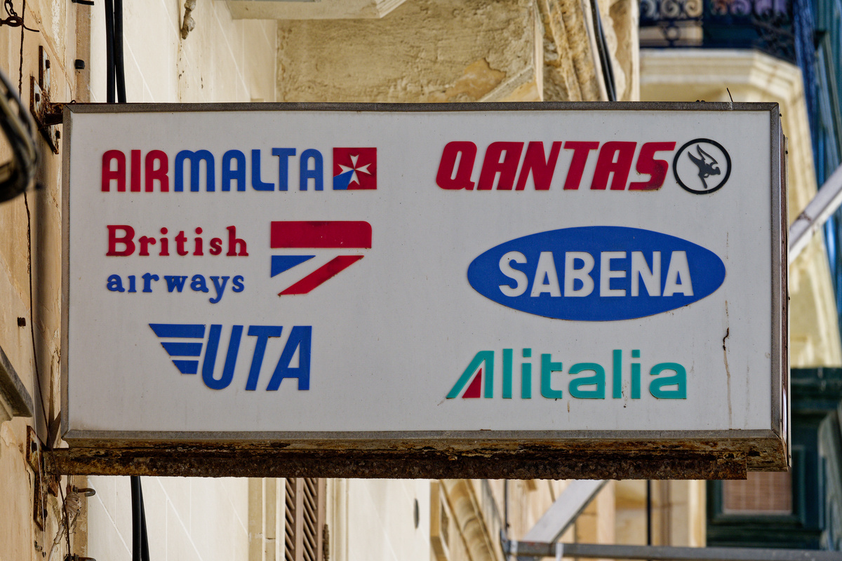 Sign featuring vintage airline logos